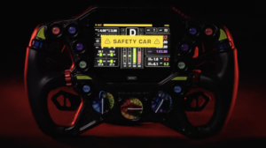 MoTeC unveils FIA-integrated carbon fiber racing wheel.