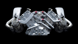 The GMR 001 engine shown in isolation against a black background