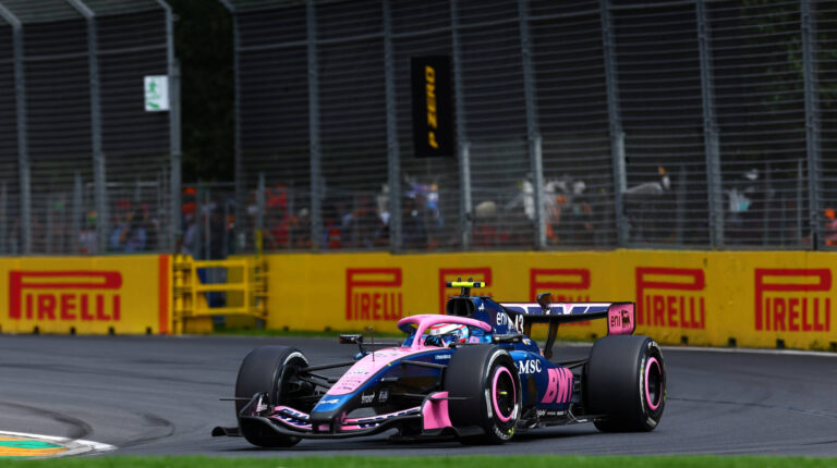 BWT Alpine Formula One Team car takes a turn at the F1 race track in Melbourne, Australia.