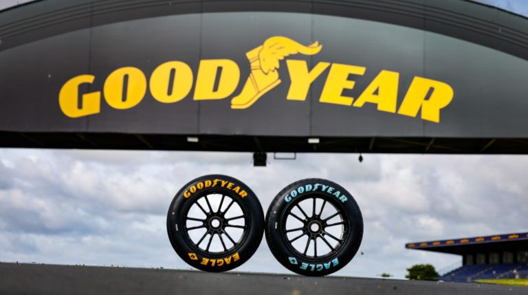 Goodyear to remain exclusive LMGT3 tire supplier through 2029 Two Goodyear tires on a display stand underneath company branding.