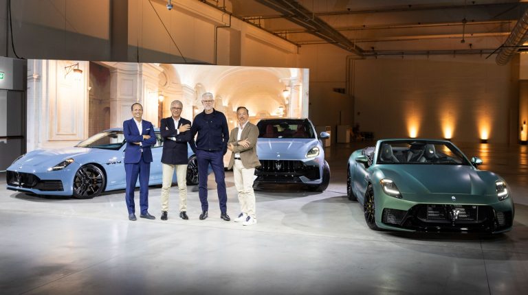 Maserati unveils updated Grecale, GranTurismo and GranCabrio Maserati representatives stand in front of the new Grecale, GranTurismo and GranCabrio in a light brown-panelled showroom.